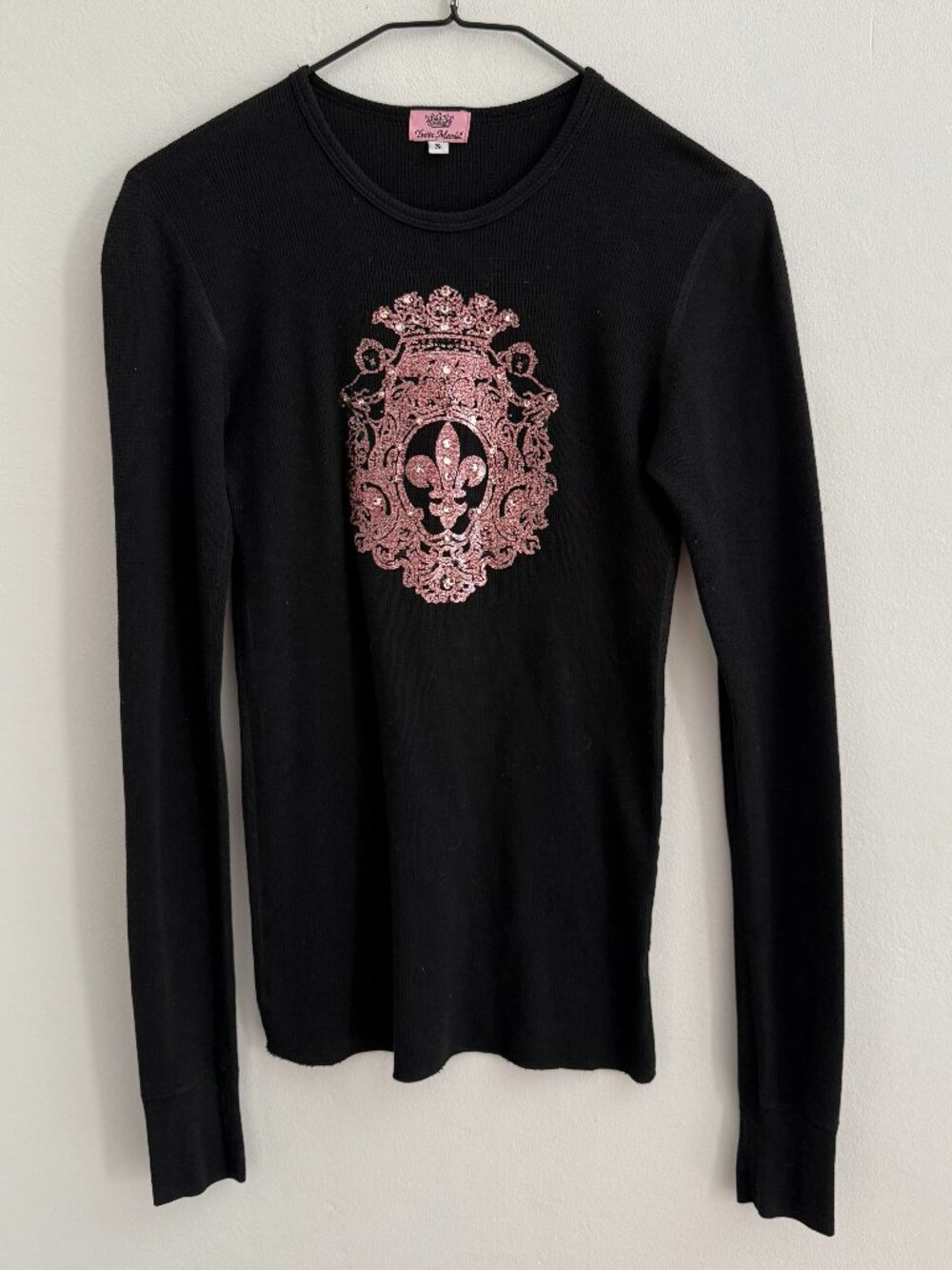 Yvette Mandell size small black long-sleeve with pink fleur de lis embellishment